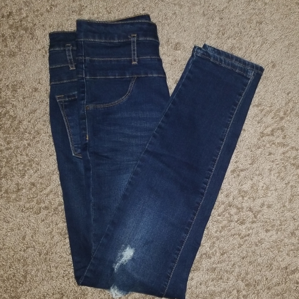 Ripped Blue Jeans
